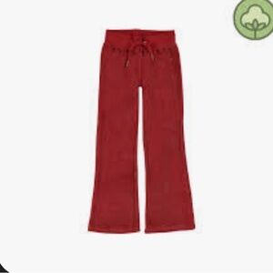 Kids Red Flared Pants. Velour. By Molo